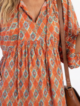 Dolly | Geometric Print V-Neck Midi Dress