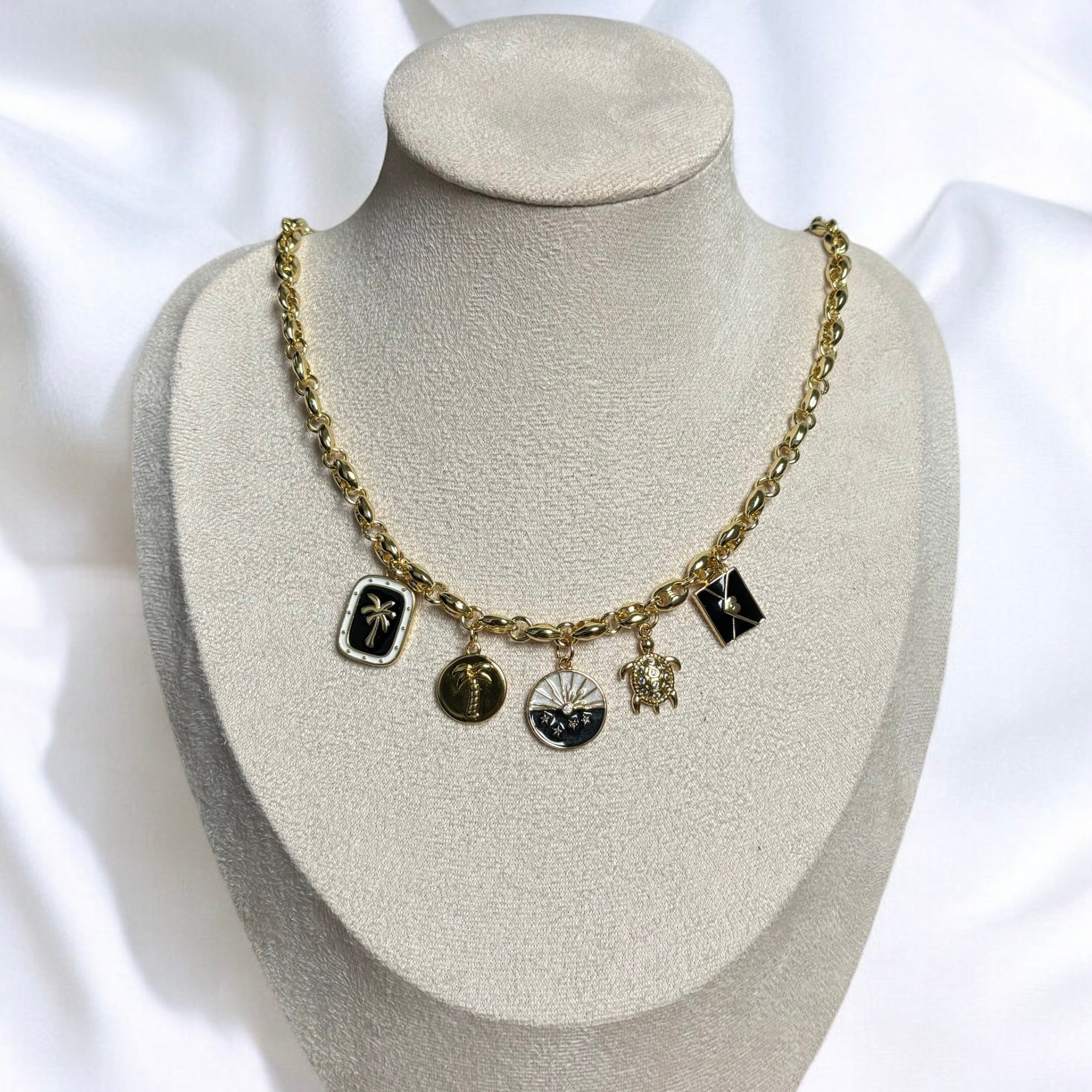 Uira | Noir Ocean Gold Charm Necklace