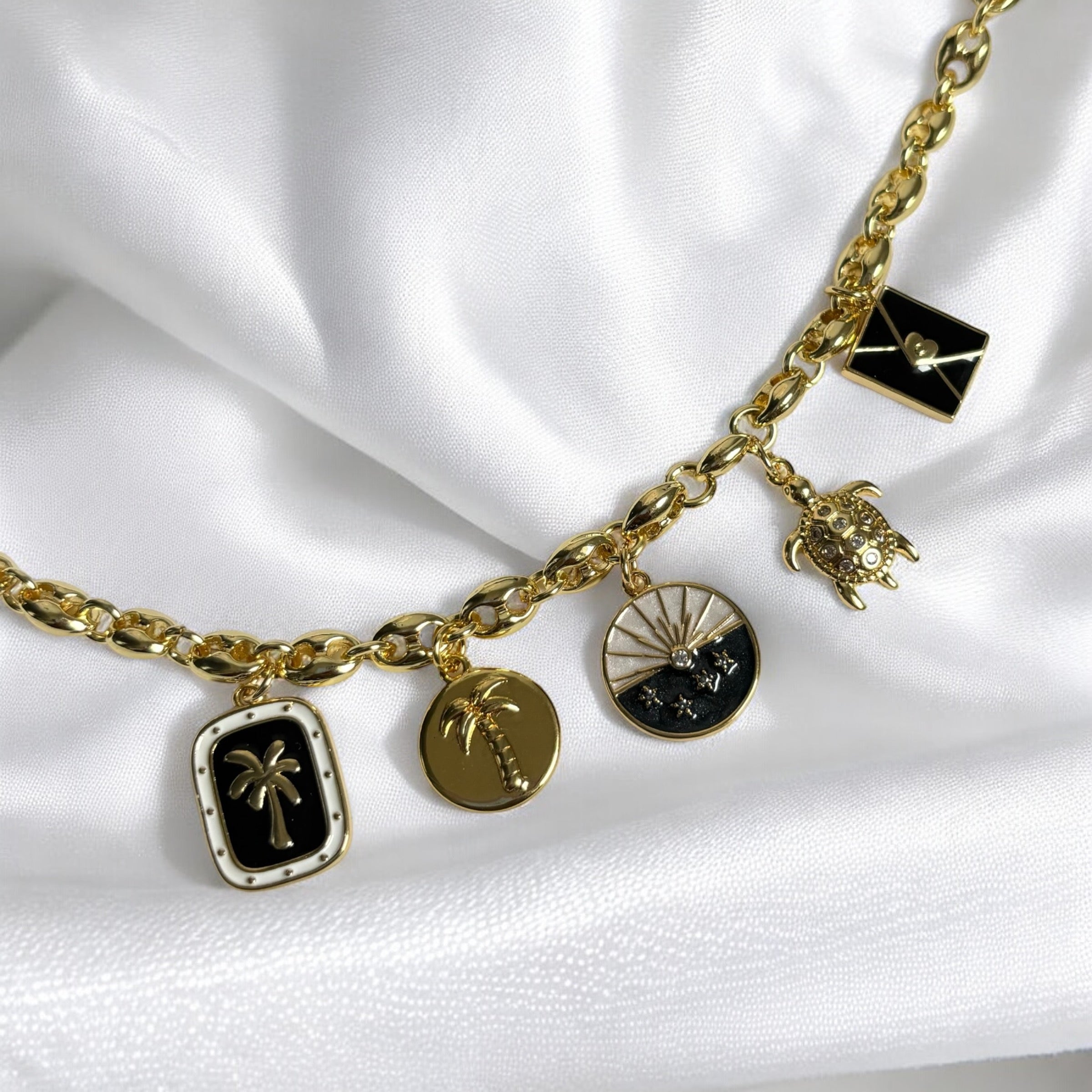 Uira | Noir Ocean Gold Charm Necklace